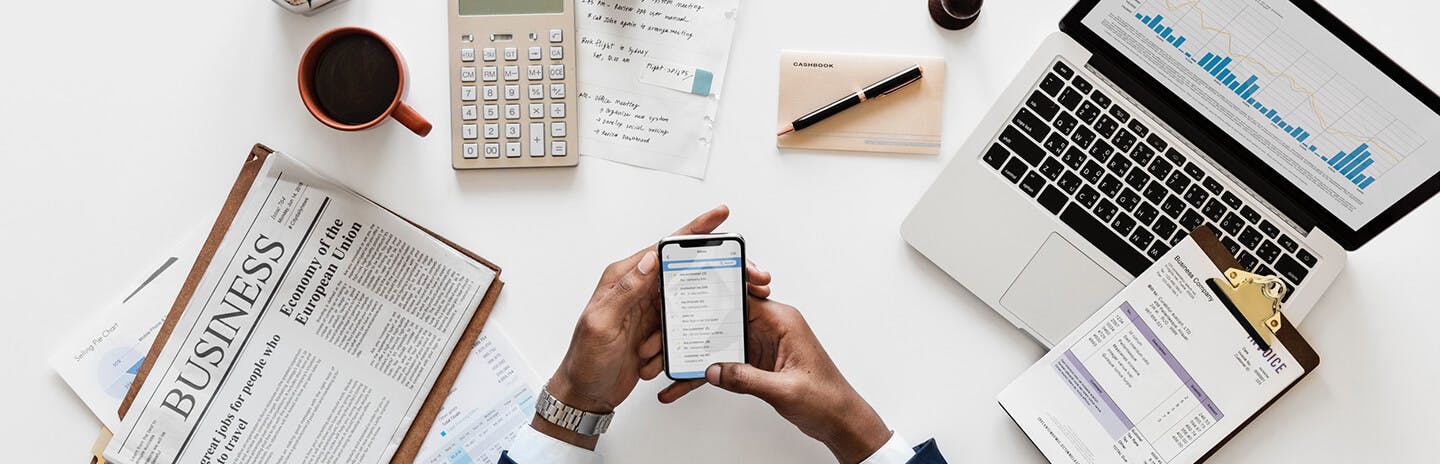 Person using a business loan repayment calculator