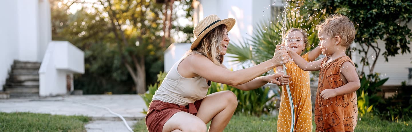 family playing after refinancing