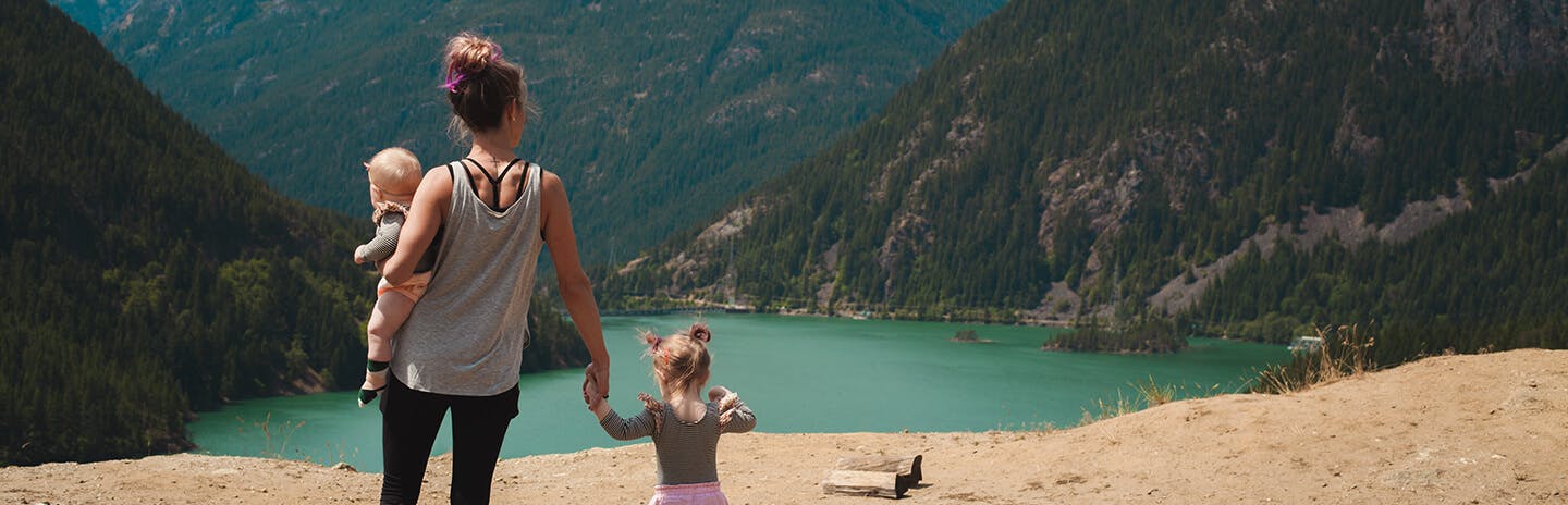 Family at the beach looking at the water
